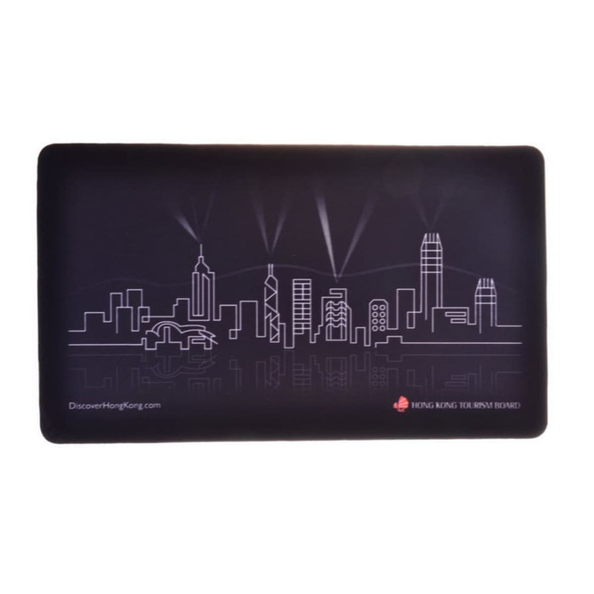 A black mouse mat featuring a skyline design in white outline, with a logo in the corner.