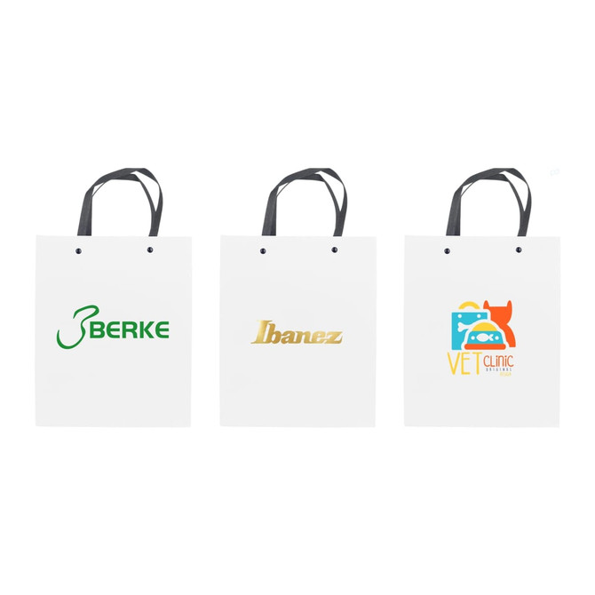 Knitted handle bags in white, featuring three different logos in green, gold, and colour print.