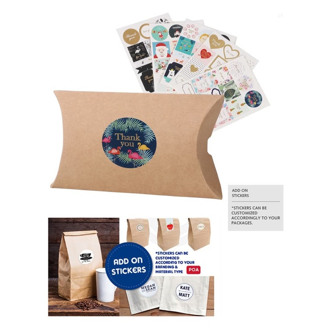 A small brown kraft pillow box featuring a round logo and assorted stickers placed behind it.