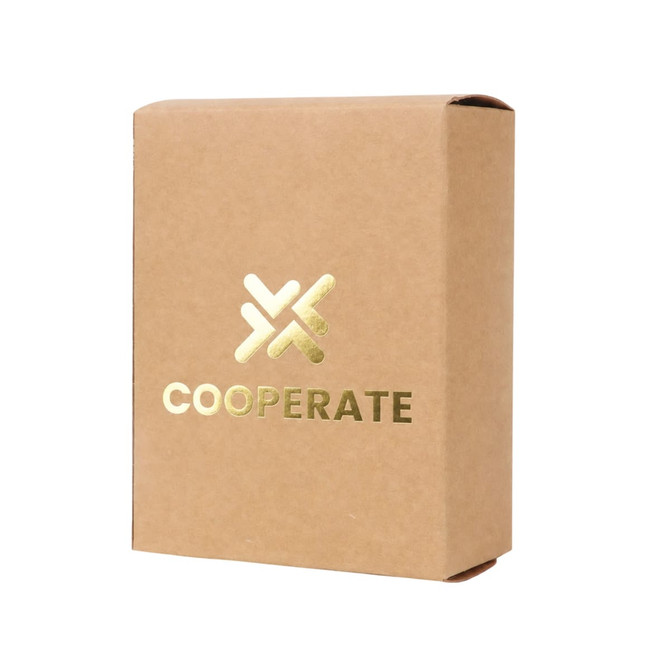 A small square gift box in kraft paper, featuring a gold logo and text on the front.