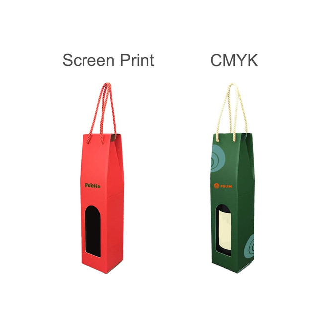 A wine box in red and green, featuring a rope handle and a cut-out window, with a logo on the green box.
