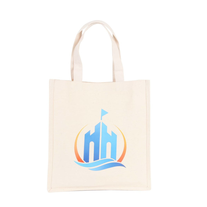 A cream cotton tote bag featuring a logo in blue and orange tones, with two sturdy handles.
