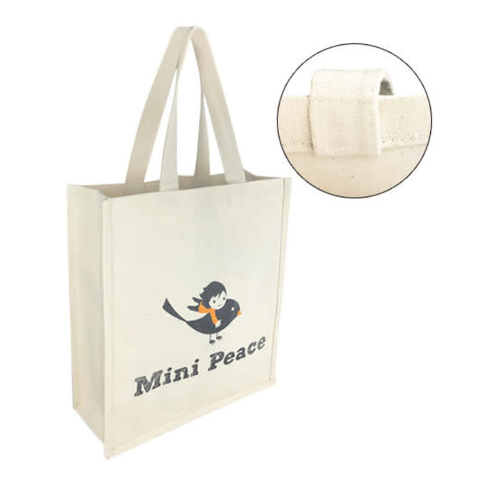 A beige cotton tote bag with long handles and a logo along with a small close-up of strap detail.