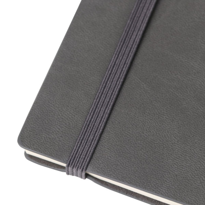 A grey PU cover notebook with an elastic band closure, featuring a textured finish.