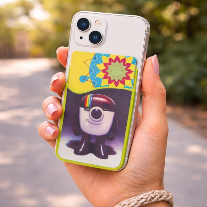 A phone wallet in vibrant colours featuring a cartoon character design, securely holding a phone and a card.