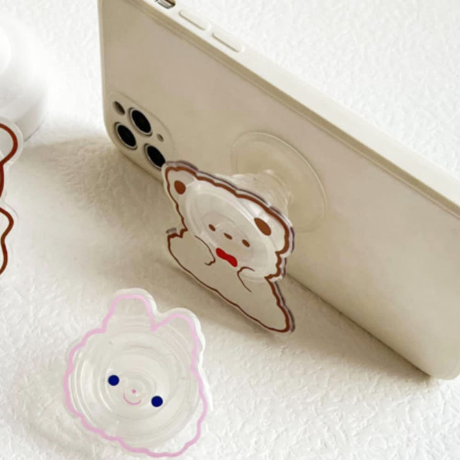 A custom-shaped acrylic phone pop holder in the form of a cute bear and bunny, featuring clear and pastel colours.