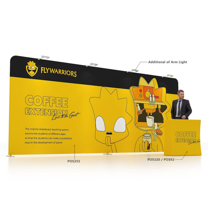 A 6m straight tension fabric display wall in black and yellow, featuring cartoon graphics and a logo, with a matching counter.