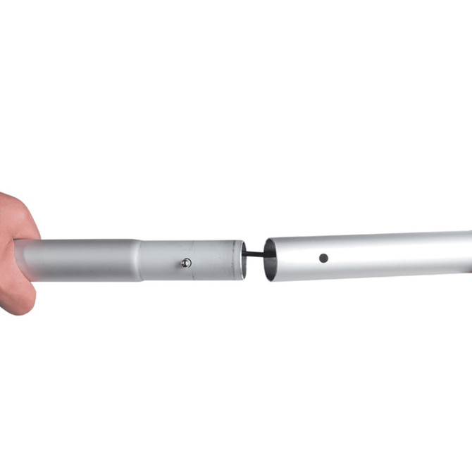 A hand connecting two sections of a silver metal pole, showcasing the assembly of an exhibition display structure.