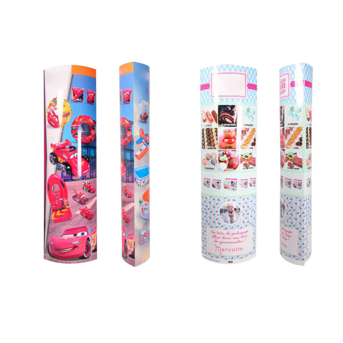 Cardboard display totems in vibrant colours featuring various cartoon characters and products, with logos and visuals on each side.