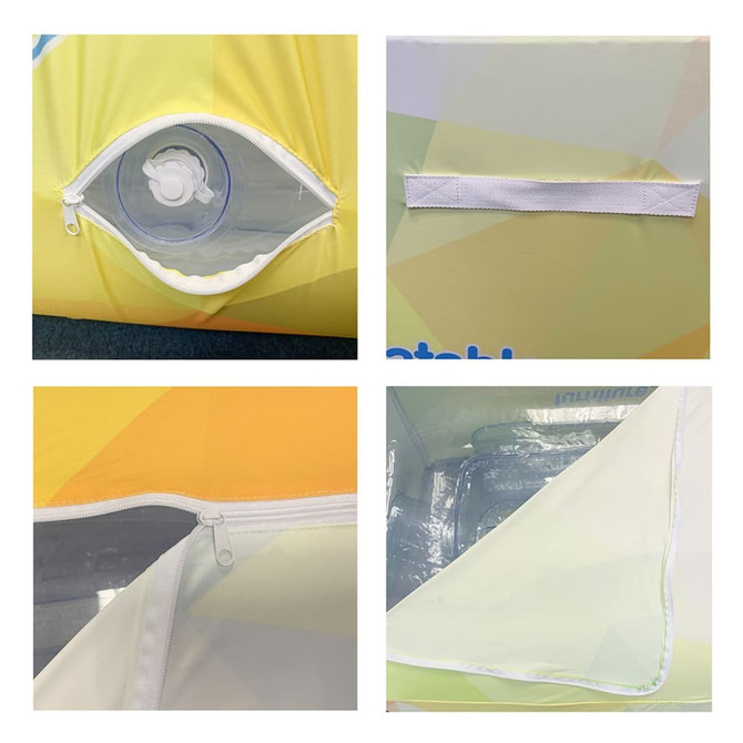 A close-up view of an inflatable two-seat sofa featuring yellow and green panels, a zippered compartment, and a transparent valve.