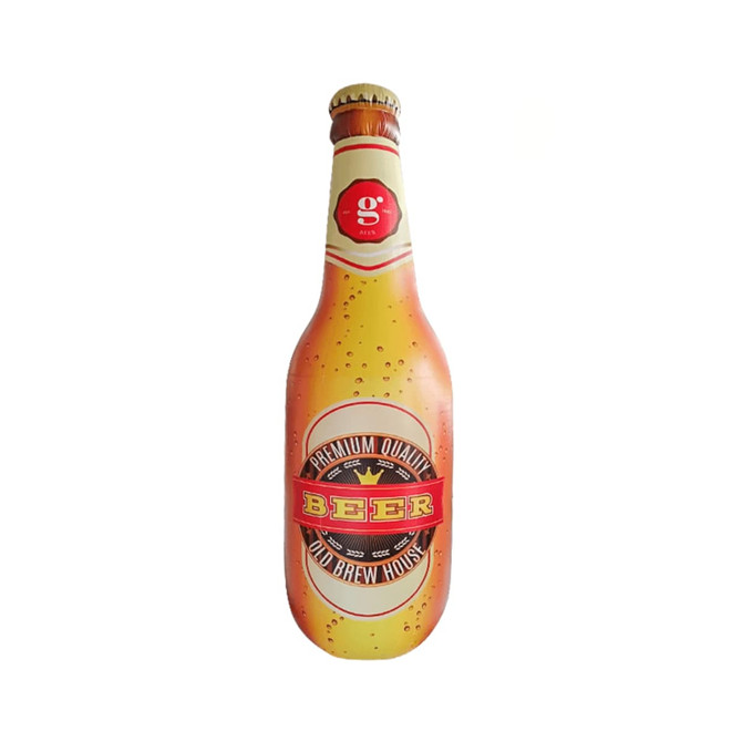 An inflatable beer bottle with a yellow-orange label featuring a logo, and details resembling condensation.