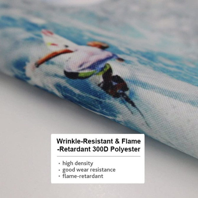 A close-up of a textured fabric featuring a design with water and a person surfing. The fabric is polyester.