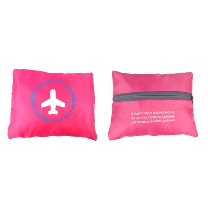 A pink travel compressed bag with a design featuring an airplane and a zippered closure. It has a logo.