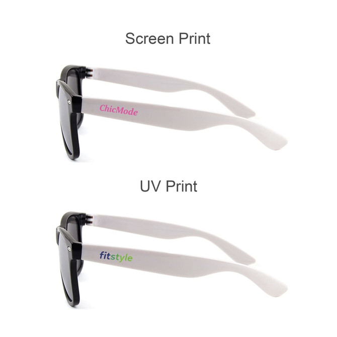 Stylish black sunglasses featuring white arms with printed branding. Includes two different print styles on the arms.