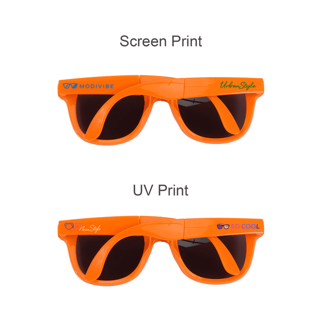 Two pairs of orange folding sunglasses with different printed designs on the frames. One has a logo.