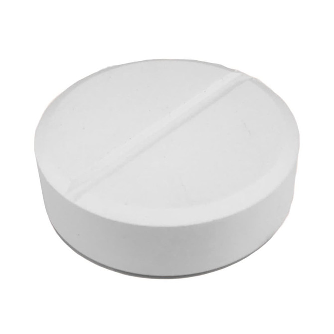 A round, white tablet-shaped stress reliever with a smooth surface and a shallow groove across the middle.