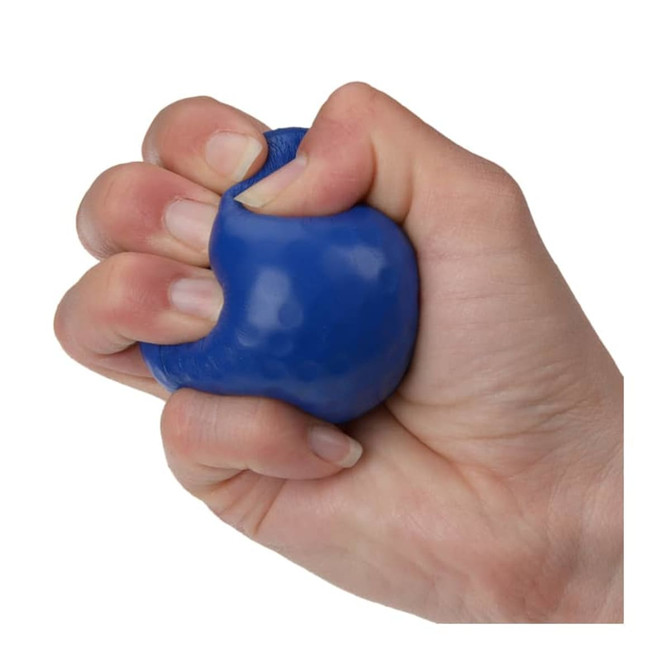 A blue golf ball-shaped stress reliever being squeezed in a hand, featuring a textured surface and a logo.