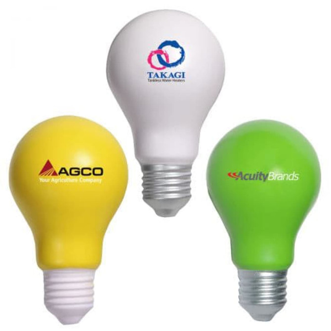 Three bulb-shaped stress relievers in yellow, white, and green, featuring various logos.