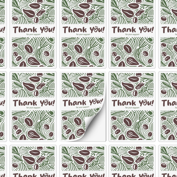 A sheet of stickers featuring a "Thank You" design in green and brown tones, with a decorative pattern.