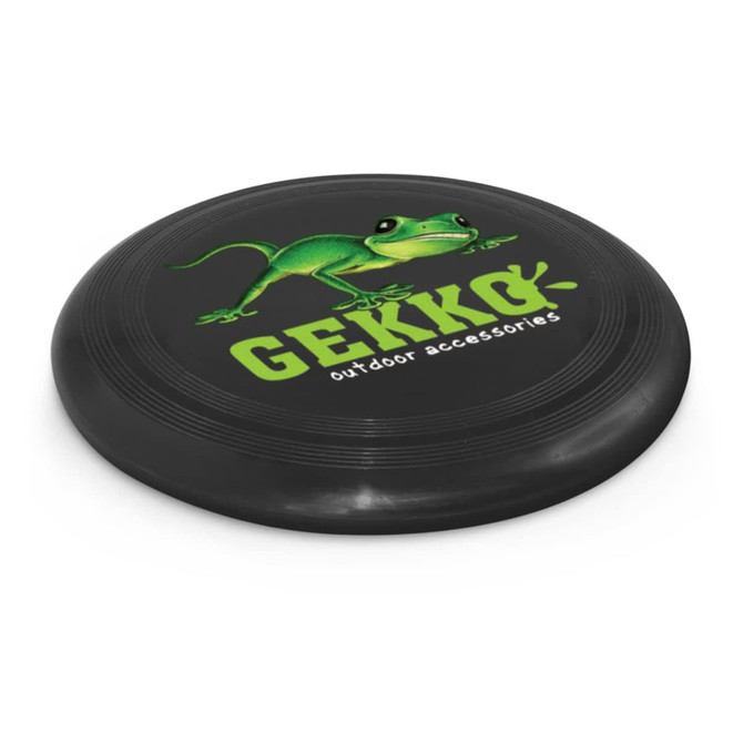 A black frisbee featuring a green lizard graphic and the brand name.