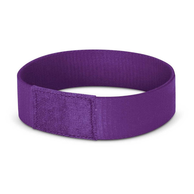 A purple Dazzler Wrist Band designed for events and exhibitions, featuring a simple elastic design.