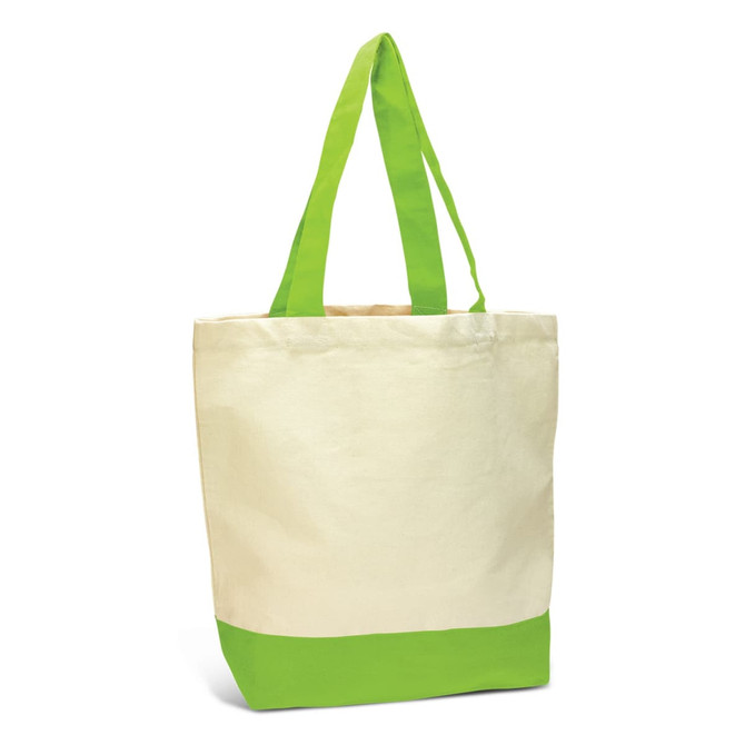 A canvas tote bag in cream with bright green handles and a green base. It features a logo on one side.
