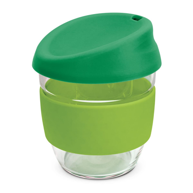 A drink bottle made of borosilicate glass, featuring a green silicone lid and band.