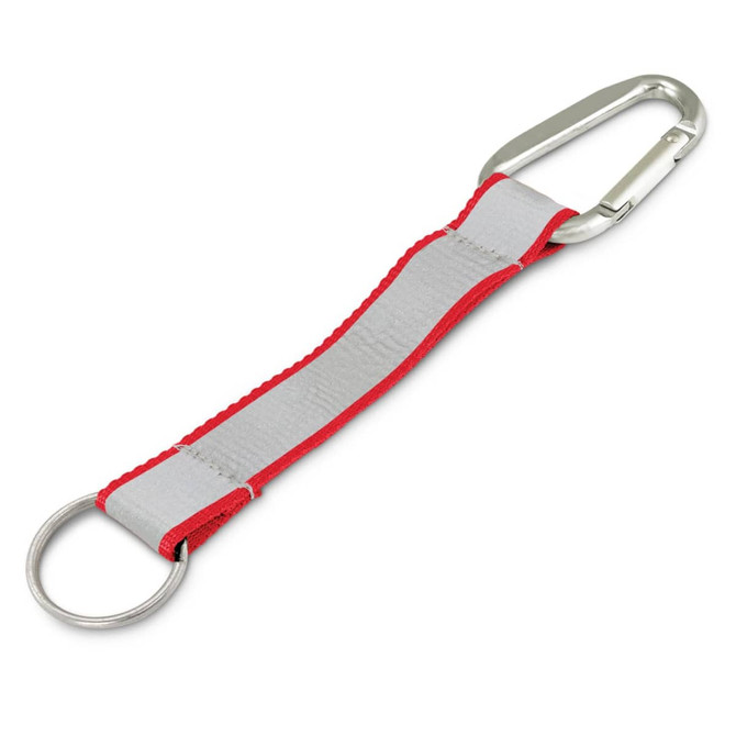 A reflector key ring with a red and grey strap and a metal carabiner clip. It includes a round ring for keys.