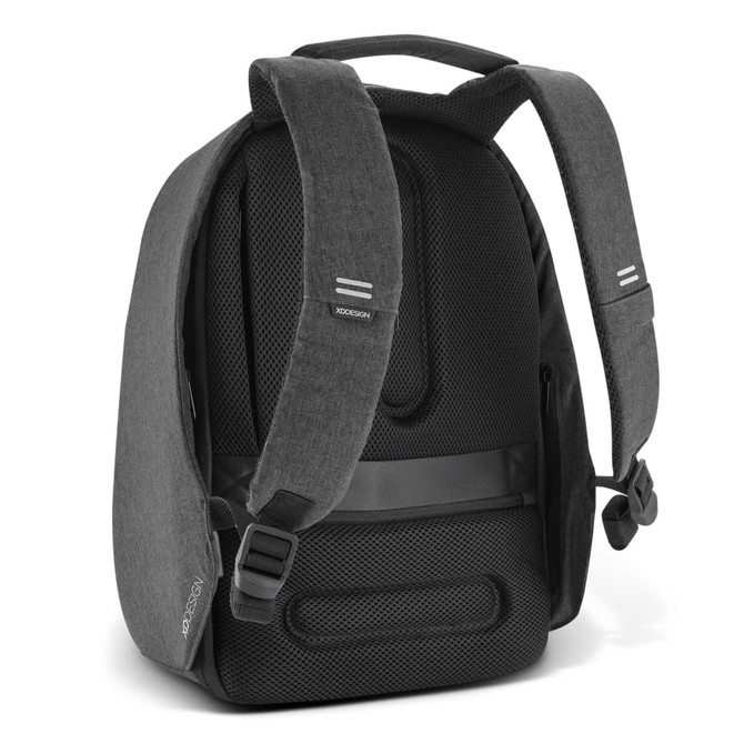 A grey backpack with a textured surface, featuring padded straps and a branded logo.