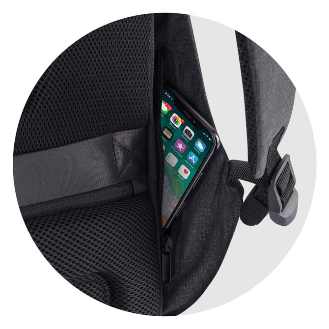 A black backpack with a mesh pocket, featuring a phone tucked into an exterior zippered compartment.