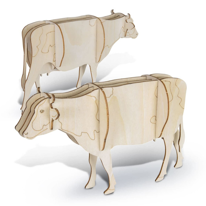 Two intricately cut wooden cow models in a natural wood colour, showcasing a three-dimensional design.