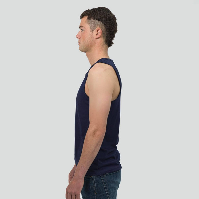 A navy blue sleeveless tank top on a model, featuring a plain design and a logo on the fabric.