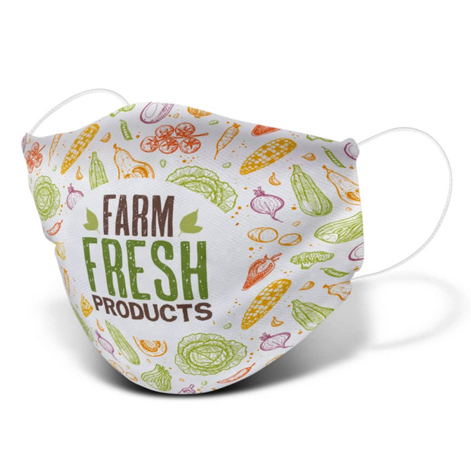 A large reusable face mask featuring a colourful pattern of vegetables with a logo.