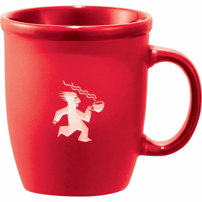 A red ceramic coffee mug with a curved handle and a logo depicting a character running with a cup.