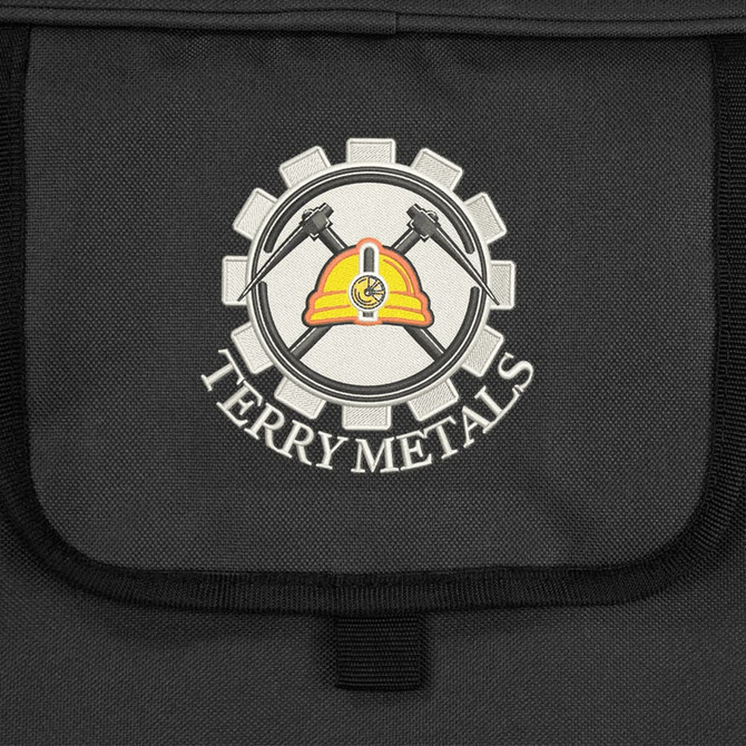 A black cooler bag featuring a logo with a hard hat and crossed tools in the centre.