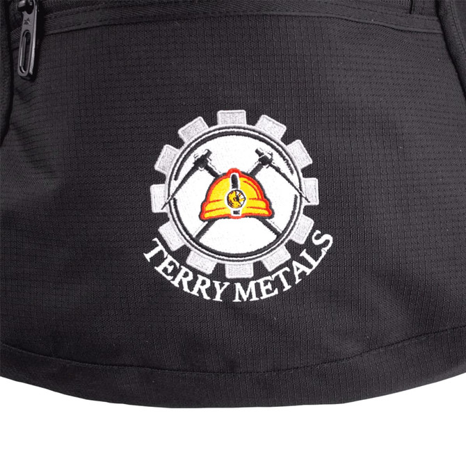A black backpack featuring an embroidered logo with a helmet and gear design.