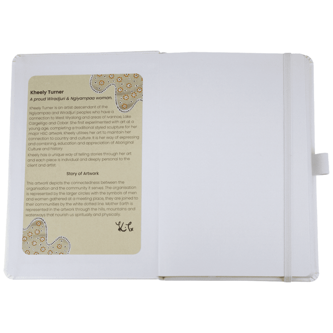 A journal with a white cover and an internal artwork display, featuring a logo and text about the artist and their work.