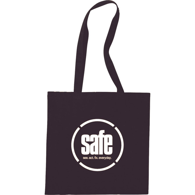 A black cotton tote bag with a circular logo in white. It has two long handles for carrying.
