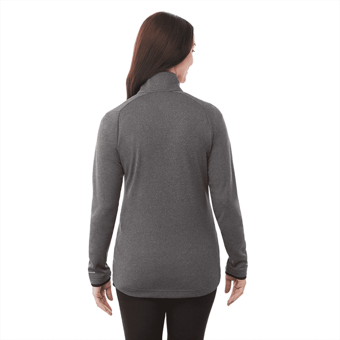 A woman wearing a grey eco-friendly knit jacket, shown from the back. The jacket features a high neck and long sleeves.
