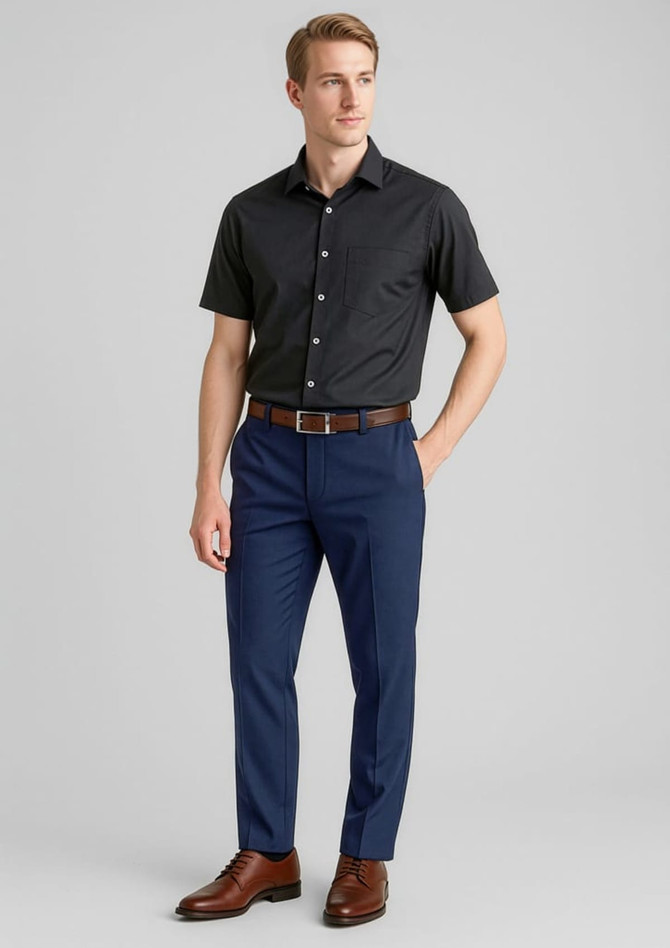 Men's comfort wool stretch slimline pant in navy blue, paired with a black shirt and brown belt. Features a logo.
