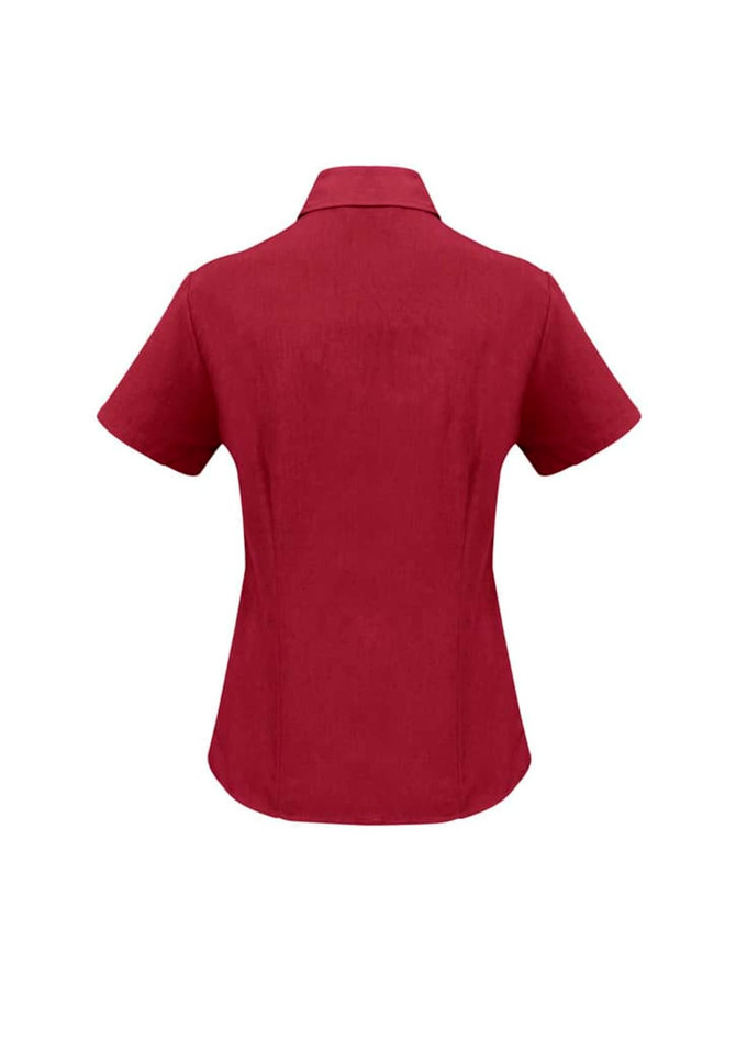 A short sleeve, button-up shirt in a deep red shade, featuring a collar and a branded logo.
