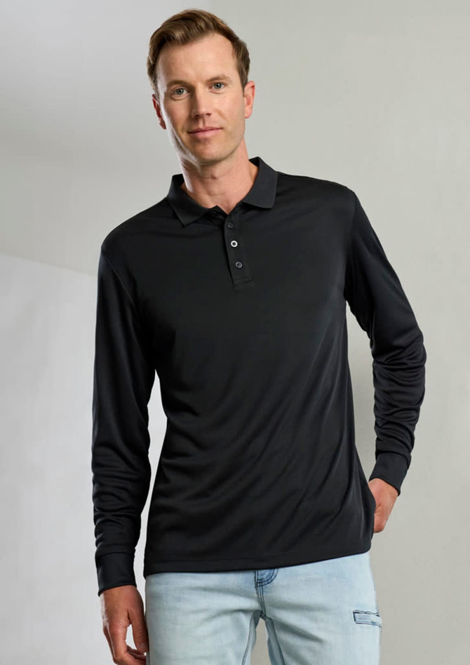 A man wearing a black long sleeve polo shirt, featuring a collar and button placket. The shirt has a logo present.