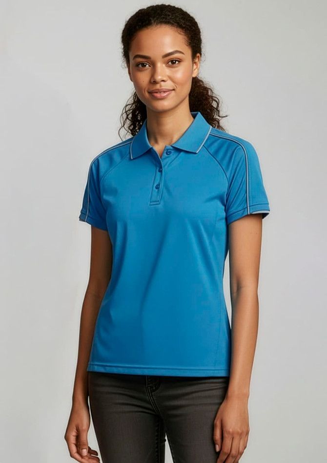 A blue women's short sleeve polo shirt with a logo on the chest and a sleek, modern design.