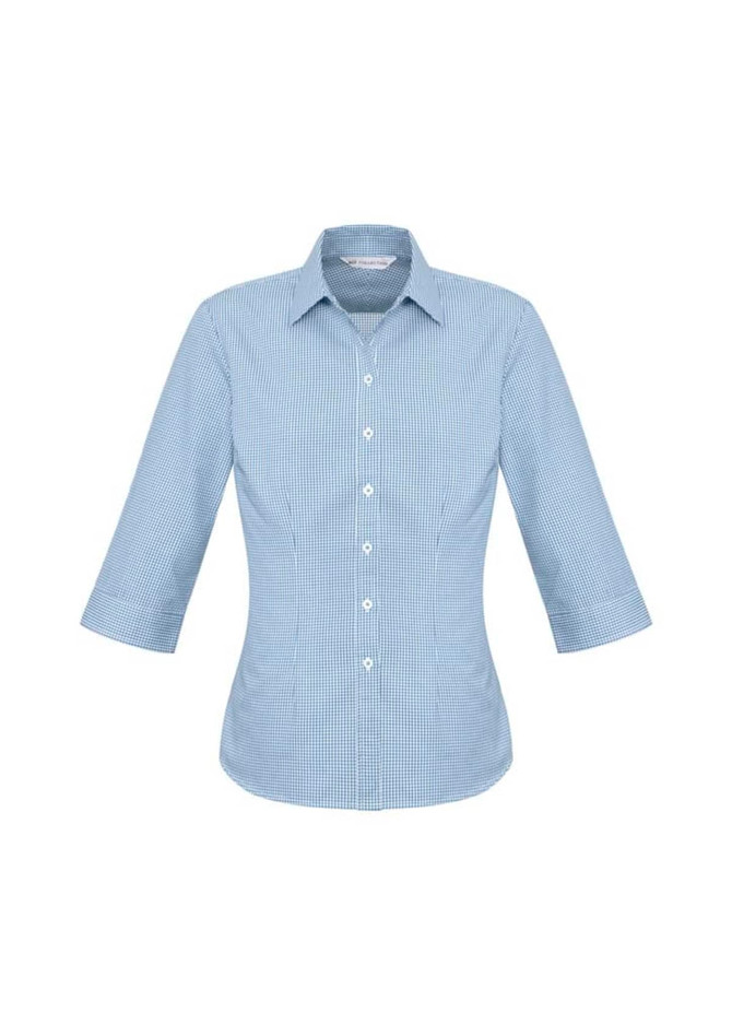A women's 3/4 sleeve button-up shirt in a light blue check pattern, featuring a classic collar and a logo.