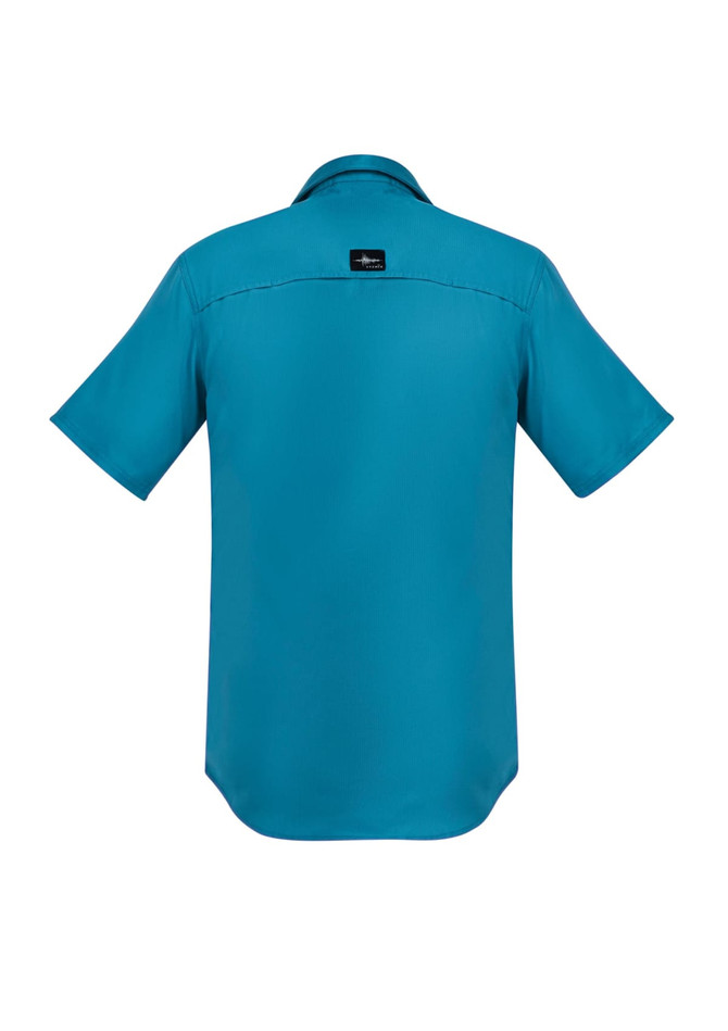 A short-sleeve button-up shirt in teal, featuring a collar and a logo on the back.