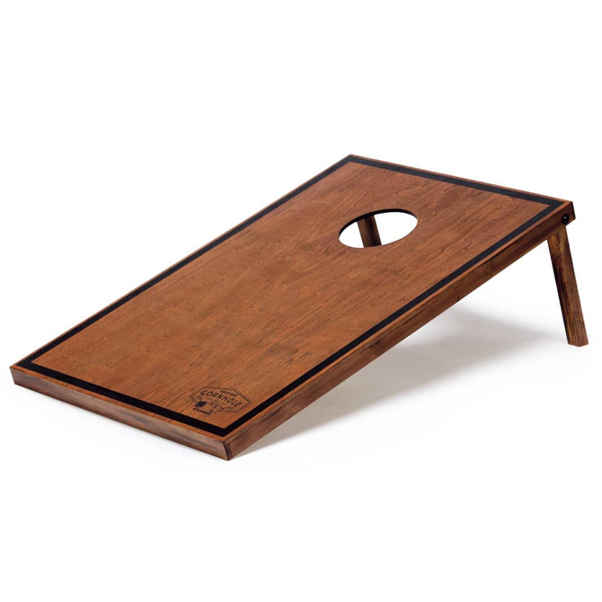 A wooden cornhole board with a polished finish and a circular hole, featuring a sturdy folding leg design.