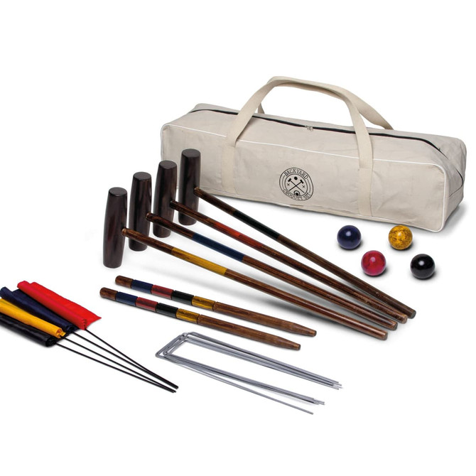 A croquet set featuring wooden mallets, balls in various colours, metal stakes, and a canvas carry bag.
