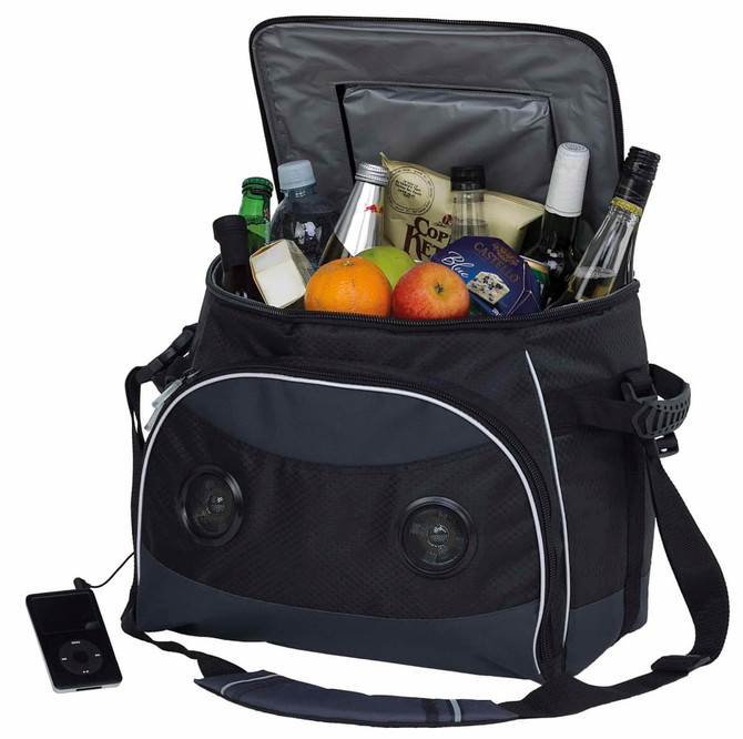 A black cooler bag with drinks and fruit inside, featuring speakers on the front and an attached device.