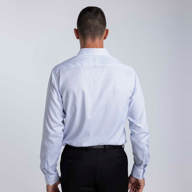 A men's button-up shirt in light blue check pattern, with a collar and long sleeves, featuring a logo.