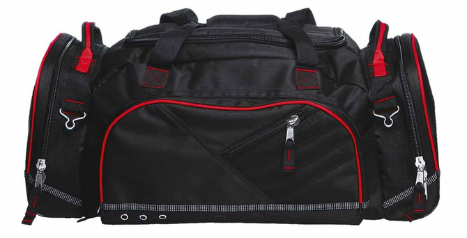 A black duffle bag with red accents and multiple compartments, featuring zippers and handles.